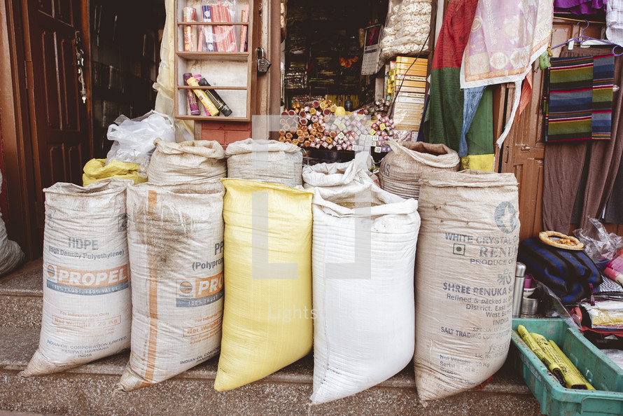 sacks of grains at a market in Nepal 