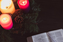 Advent wreath with candles and Bible