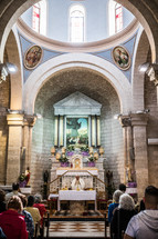 worship service in an ancient church in the holy land 