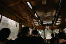 wedding guests on a trolley bus