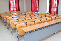 Empty classroom with wood chairs