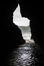 sunlight through the mouth of a sea cave