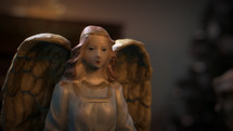 CGI Colorful Christmas Nativity set on coffee table focusing on Angel.