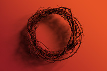red background with crown of thorns 