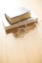 Bible, journal, and earbuds