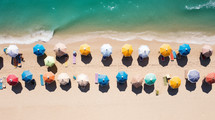 Colorful umbrellas on a summer beach. 