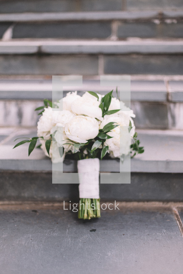 bridal bouquet on steps 