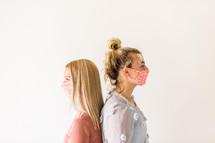 teen girls in face masks 
