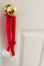 Christmas decoration on doorknob with sparkle effect