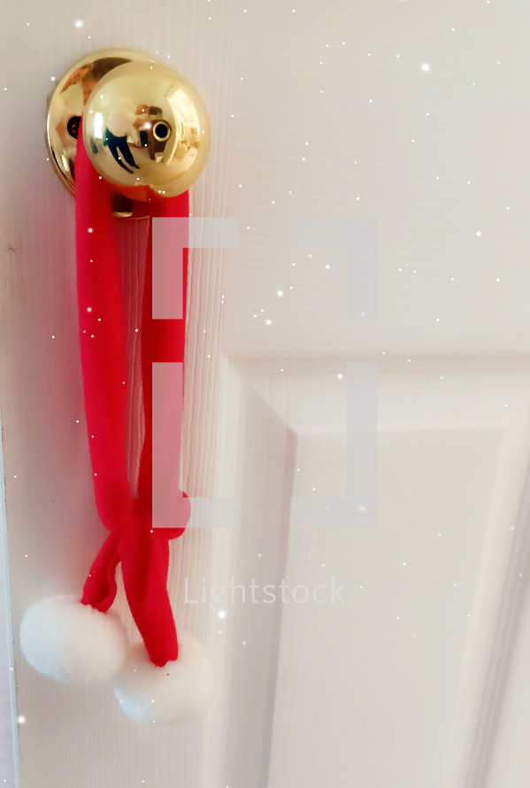 Christmas decoration on doorknob with sparkle effect