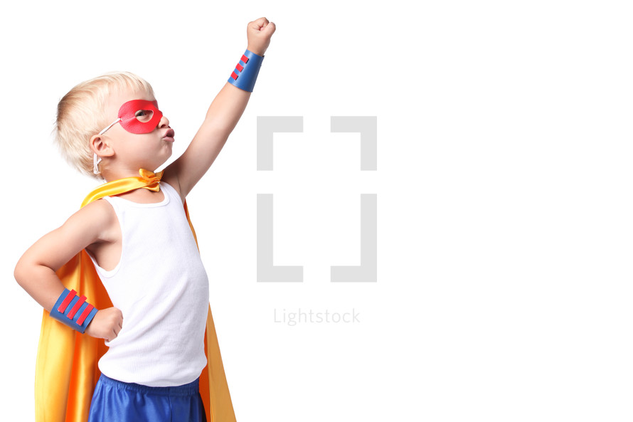 Little kid dressed as super hero. 