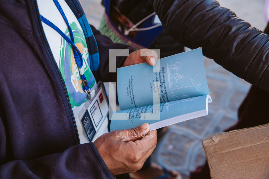 man holding a Bible in Myanmar