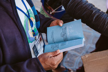 man holding a Bible in Myanmar