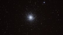 Zoom in on a globular star cluster in outer space