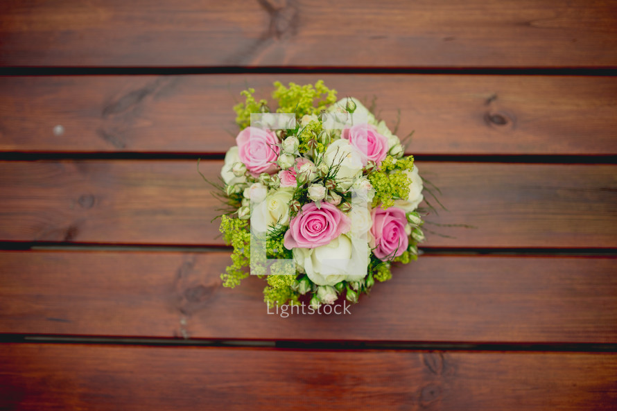 bouquet of flowers on a wood table 