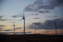 wind turbines at sunset 