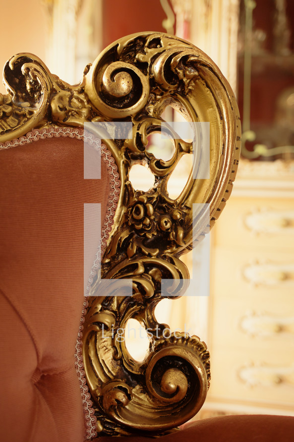 Detail of a decoration of a baroque style sofa.