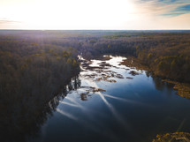 aerial view over a lake in fall 