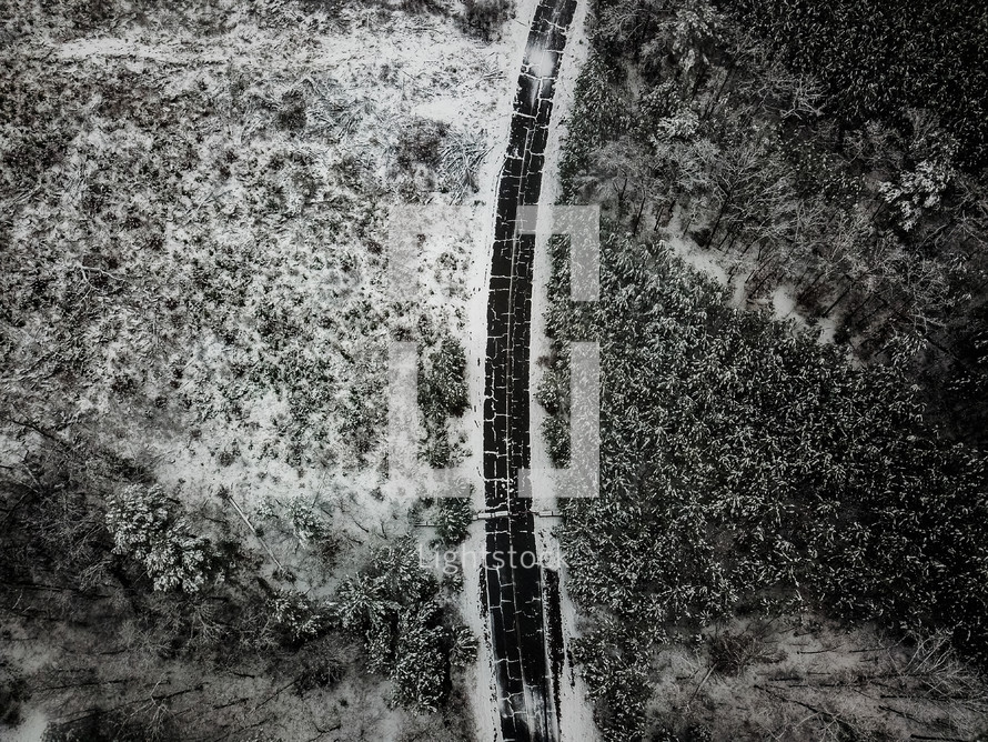 aerial view over a snow road 