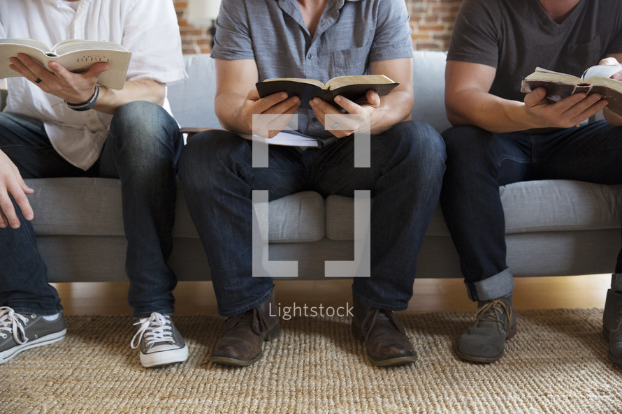 men's group Bible study discussing scripture 