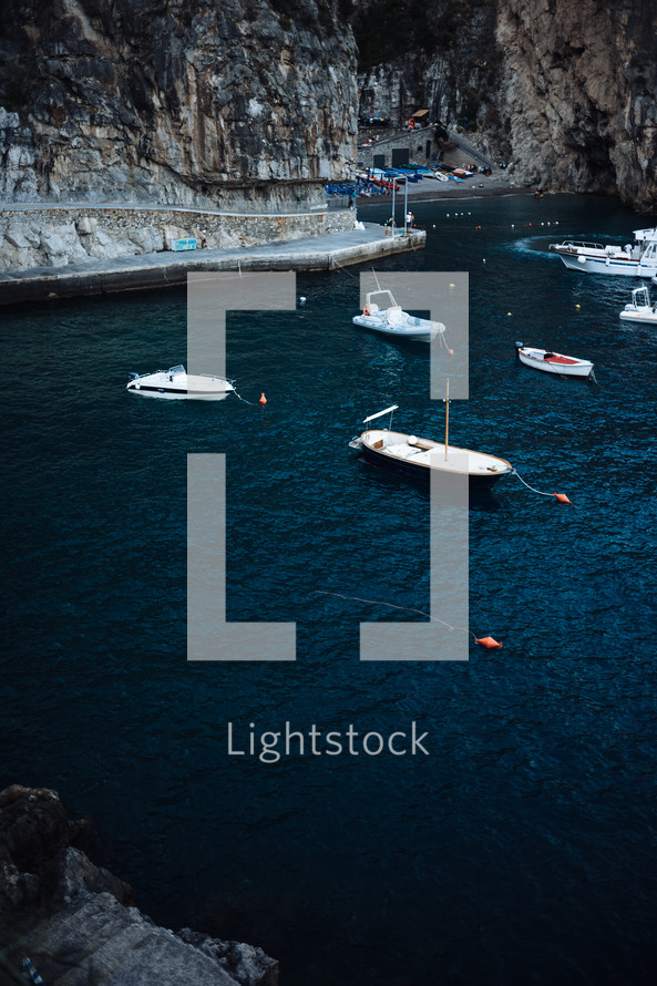 anchored boats in a bay 