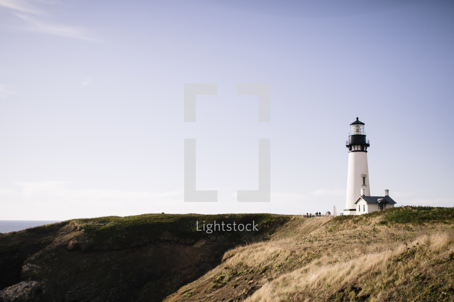 lighthouse overlooking the ocean 