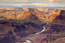 river through a red rock canyon 