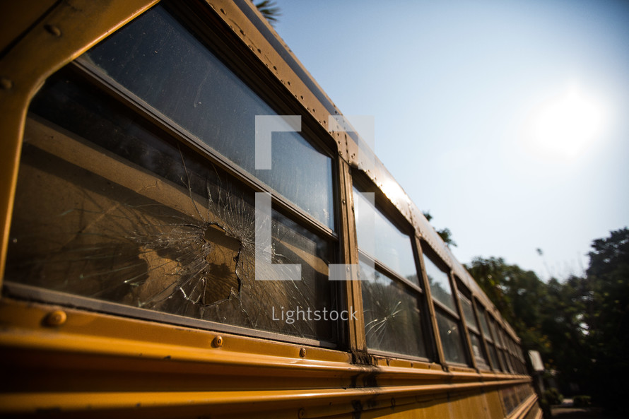 broken window on a school bus