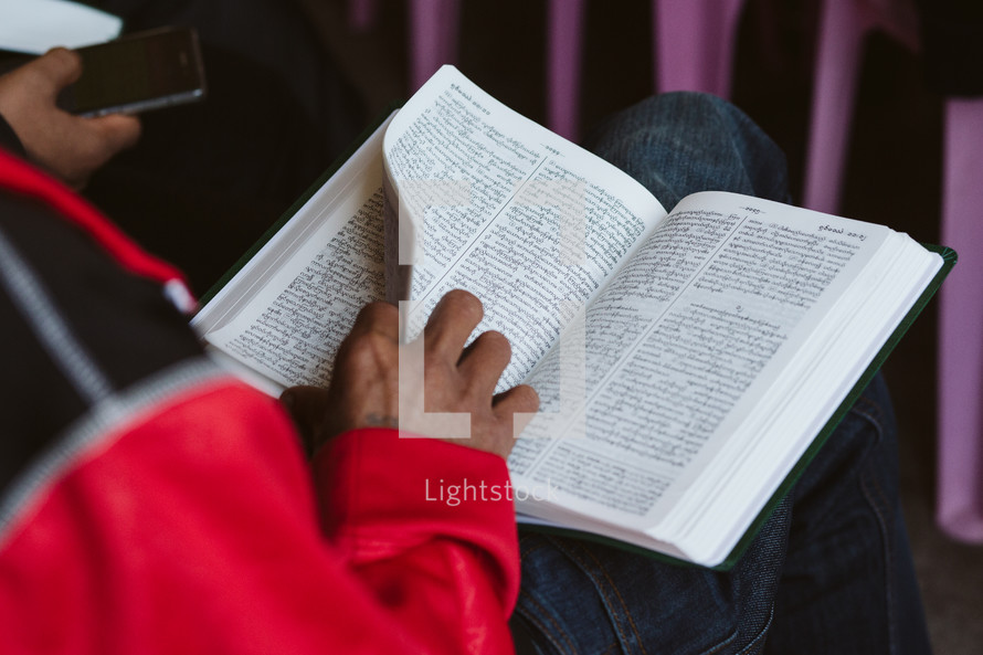 man holding a Bible in Myanmar