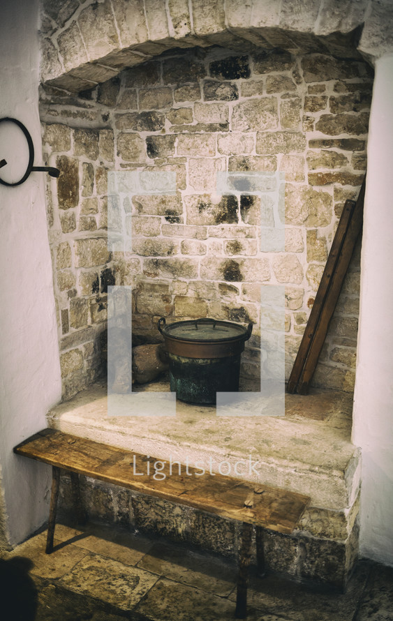 Old fireplace used for cooking inside a trullo in Alberobello.
