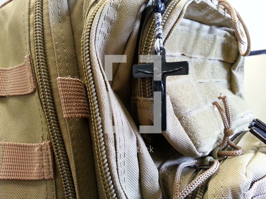 cross on a backpack