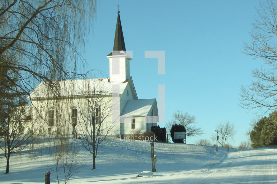 white church in snow 