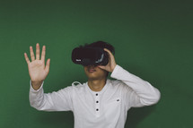 a man wearing VR glasses 