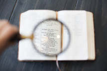 Magnifying glass on Proverbs 31 in the Bible