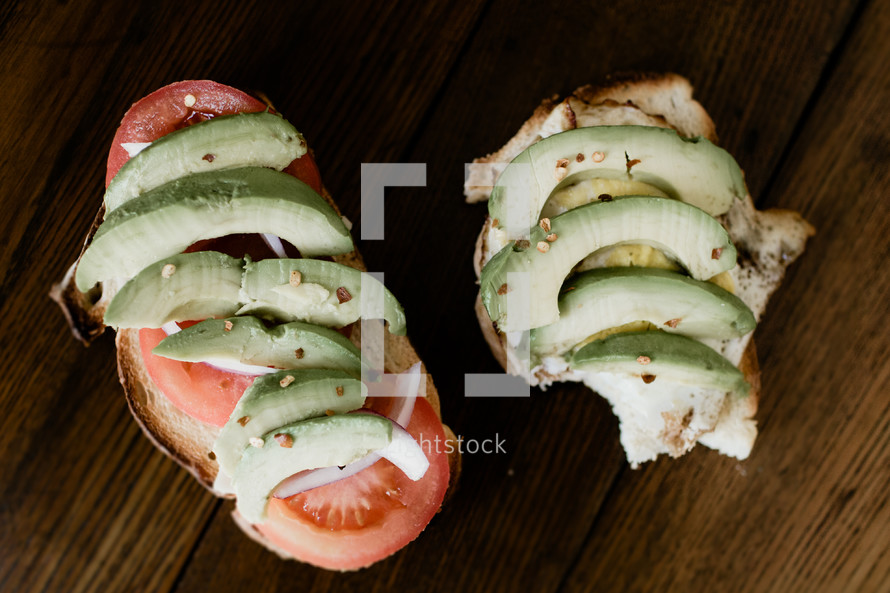 avocado and tomato on a sandwich 