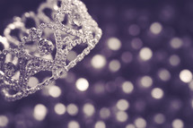 crown and purple bokeh background 