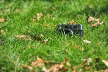 vintage camera in grass