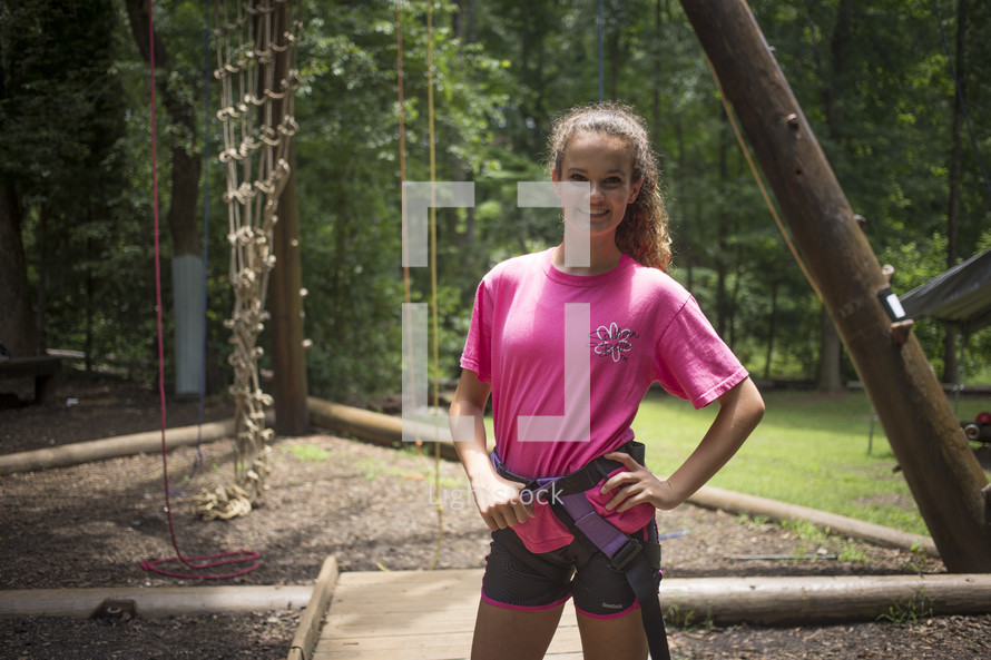 teen girl at summer camp - ropes course