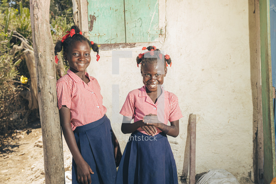 smiling school children in a village 