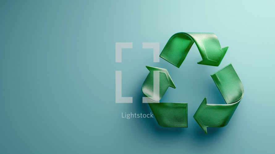 Green recycling symbol on a light blue background, emphasizing sustainability and environmental awareness. Perfect for eco-friendly and recycling-themed projects.