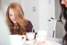 prayer and breakfast at a woman's group gathering 