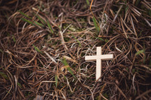 wood cross in grass