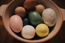 wooden Easter eggs in a bowl 