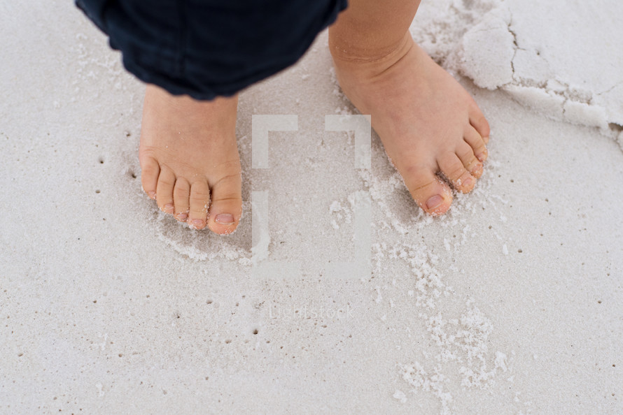 bare feet in sand 