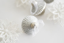 white and silver Christmas ornaments 
