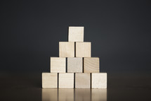 stacked blank wooden blocks 