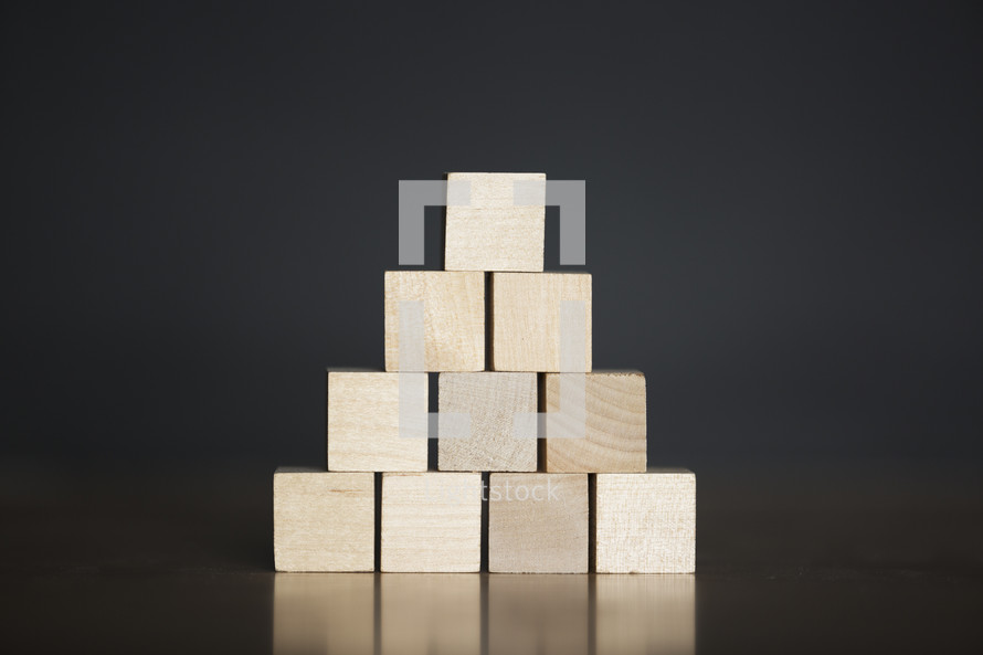 stacked blank wooden blocks 