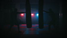 Silhouette of Boxing fighter in the gym