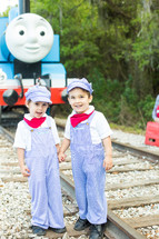 boys in front of Thomas the Train Engine 