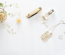 gold and white eclectic items 